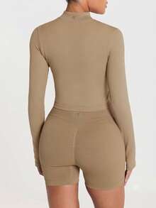 11SKNDS Ribbed Seamless Zip-Up Crop Jacket Long Sleeve Mock Neck Body-Enhancing Fitted Activewear Top - Mocha Brown - View 2