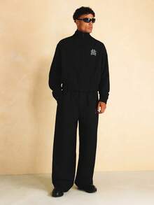SUMWON Wide Leg Nylon Textured Jogger Pants With Monogram Embroidery Logo Detail And Elastic Waistband - Black - View 3
