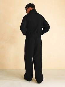 SUMWON Wide Leg Nylon Textured Jogger Pants With Monogram Embroidery Logo Detail And Elastic Waistband - Black - View 5