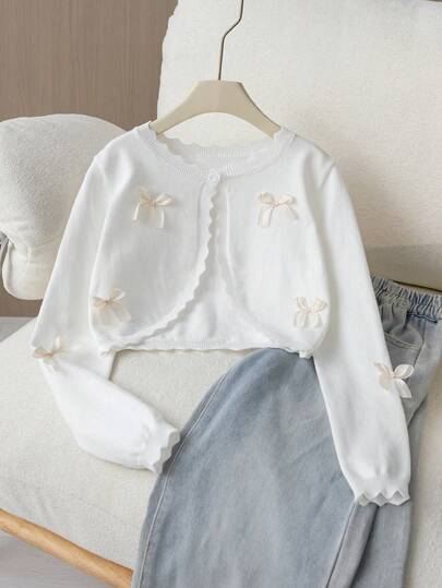 SHEIN Cárdigan corto de punto blanco con estampado integral para niñas, con ribete de encaje, cuello redondo, manga larga, decoración de lazo, chaqueta suéter tipo chal versátil para primavera/otoño, lindo