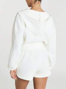 11SKNDS Áo nỉ croptop dáng rộng kéo khóa với khóa kéo bạc, vai trễ, đắp logo, món đồ layer cơ bản thường ngày, thấm hút mồ hôi và mềm mịn như bơ, dành cho tập gym, thể hình, chạy bộ, tập luyện và Hy-Rox - trắng - Xem 2