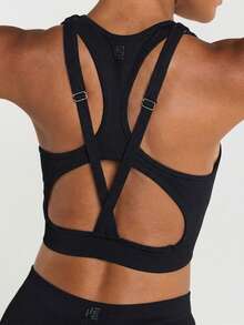 11SKNDS Sports Bra With Racerback Design Adjustable Straps Cross Back Cutout Detail High Impact Seamless Supportive Bra With Sweat-Wicking, Stretchy, Breathable, Buttery-Soft & Removable Cups, For Gym Workout Fitness Pilates Studio, Running, Training & Hy-Rox - Black - View 1