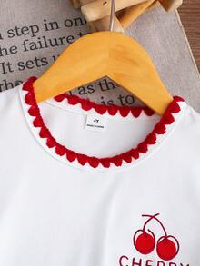 SHEIN 開學季 Xiyin 女孩甜美 2 件套，可愛櫻桃刺繡 T 恤與防走光牛仔刺繡裙褲套裝，柔軟刺繡領口設計，清新休閒百搭童裝，適合女孩日常上學、戶外玩耍與度假旅行夏季穿著 - 白色 - 查看 6