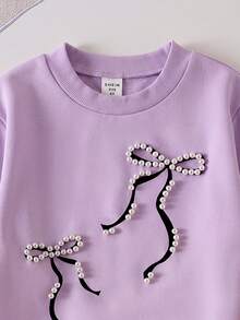 Genkimix Kids Girls' Contrast Color Webbing Bowknot Exquisite Design Pearl Round Neck Sweatshirt With Pockets Straight Leg Pants Set, Autumn School Baby Birthday - Purple - View 6