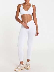 11SKNDS Leggings de punto acanalado sin costuras de cintura alta con ajuste de compresión que realza la figura para yoga, correr y ropa deportiva, largo 7/8 - Blanco - Ver 2