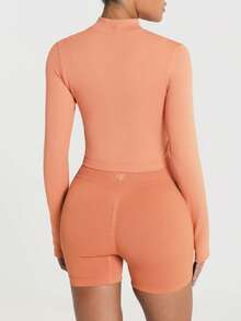 11SKNDS Ribbed Zip-Up Cropped Sports Jacket With Mock Neck Long Sleeves And Thumbhole Cuffs Slim Fit Activewear Layer For Spring Summer Gym - Orange - View 3