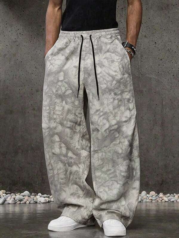 ROMWE MEN Street Life Pantalones largos casuales holgados para hombre con estampado de patrón de hojas, bolsillo y cintura con cordón