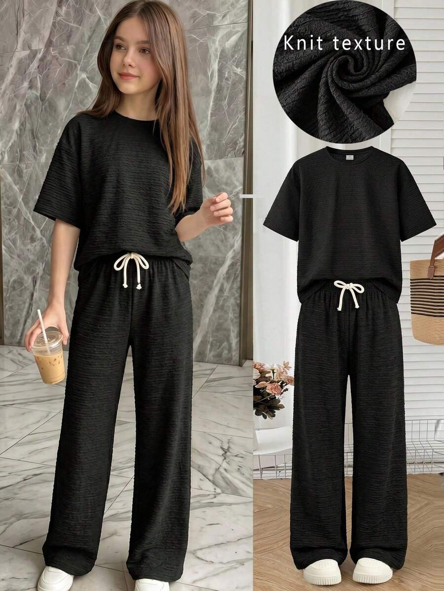 Setelan 2 Potong untuk Anak Perempuan Remaja: Kaos Rajut Hitam Lengan Pendek Leher Bulat dengan Tekstur Bahu Jatuh dan Celana Panjang Longgar, Cocok untuk Pakaian Kasual Sehari-hari, Kembali ke Sekolah, dan Gaya Busana Preppy. - Hitam - View 1