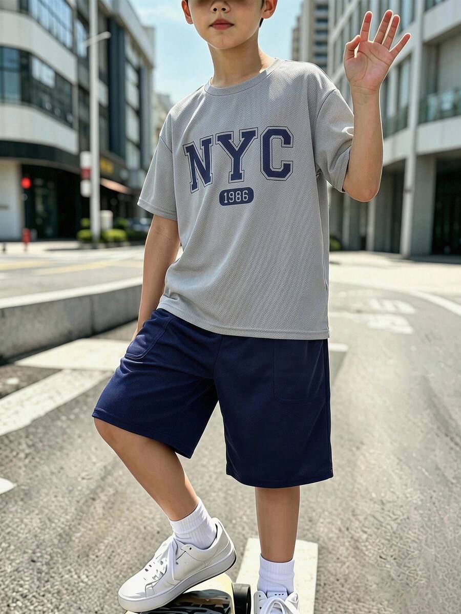 SHEIN 2pcs Setelan Anak Laki-laki Remaja Kasual Longgar Nyaman dengan Logo Merek, Atasan Lengan Pendek dan Celana Pendek, Musim Semi/Panas - Grey - View 1