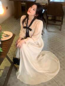 DAZY 拼接撞色荷葉領波浪下擺收腰A字版型優雅度假風夏季女款長洋裝 - 杏色 - 查看 2