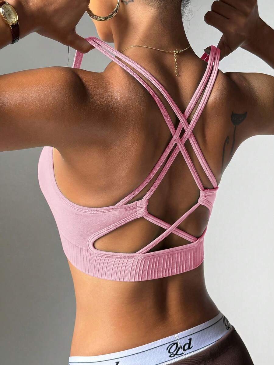 Core Rhythm Seamless Women's Solid Color Criss-Cross Sports Bra - Pink - View 1