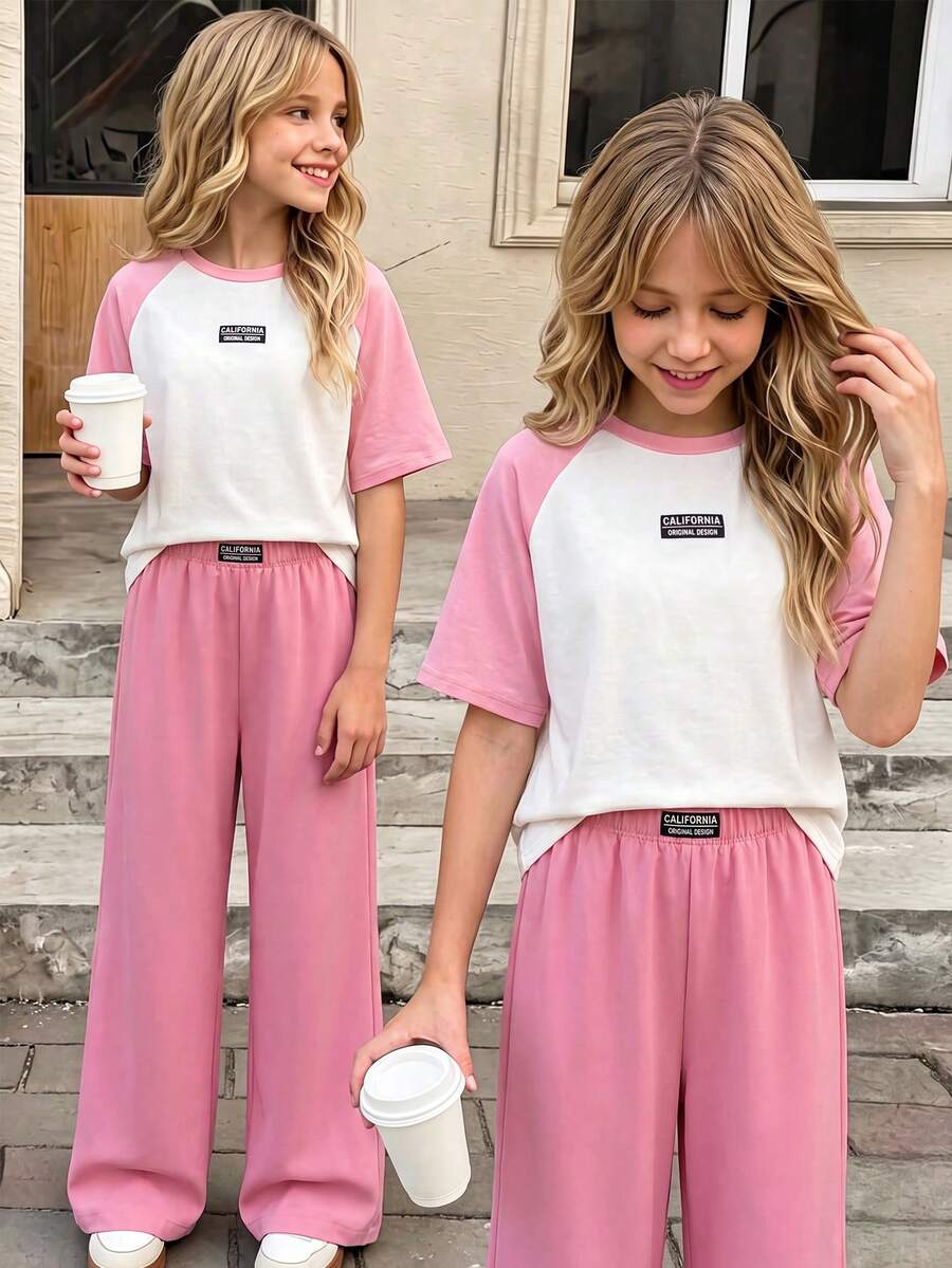 SHEIN 青少年女孩 T-Shirt 套裝,運動風粉色與深綠色拼接短袖 T-Shirt 與短褲套裝,夏季寬鬆修身設計,輕量面料,適合日常出遊、休閒運動或造型穿搭 - 粉色 - 查看 1