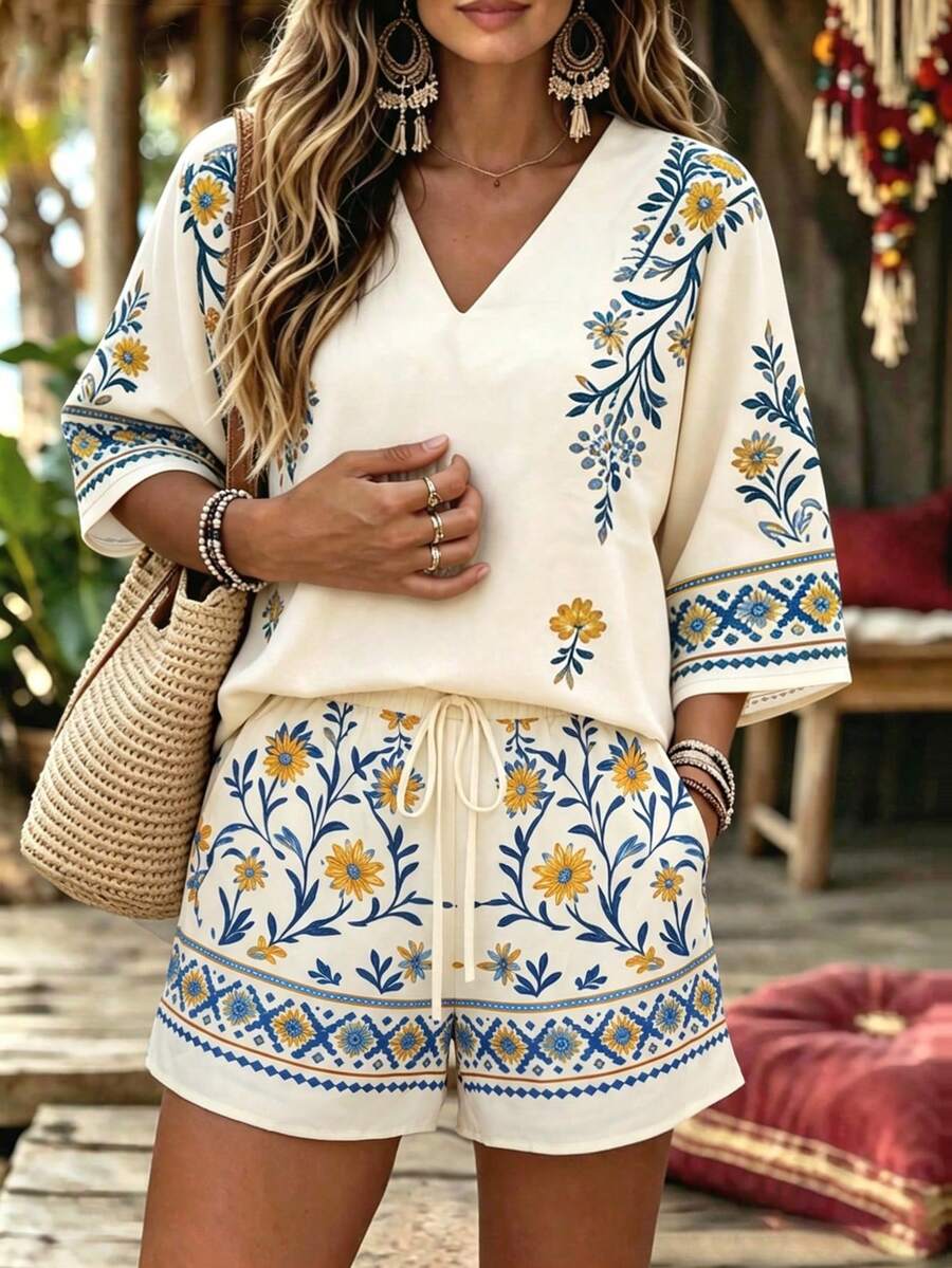 SHEIN Holidaya 女款兩件套，花卉印花短袖上衣與短褲，優雅休閒風格，適合夏季戶外海灘度假、日常穿著，適用於辦公室、商務、派對與約會 - 彩色 - 查看 1