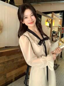 DAZY 拼接撞色荷葉領波浪下擺收腰A字版型優雅度假風夏季女款長洋裝 - 杏色 - 查看 9