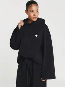 11SKNDS Oversized Cropped Hoodie With Wide Sleeves And Logo Detail, Relaxed Fit Pullover Sweatshirt For Casual Fall Winter Everyday Wear - Black - View 1