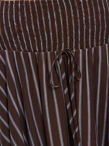 Nöista Stripe Midi Skirt With Smocked Waistband And Asymmetric Hem. Everyday, Brunch, Day-To-Night, Smart & Casual. Fall, Fall Winter Street Style. - Brown - View 6