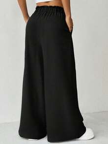 Elenzga Plus Size Solid Black Paperbag Waist Self Tie Bow Ultra Wide Leg Long Pants With Side Pockets Women Summer Casual Textured Trousers - Multicolor - View 2