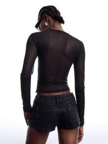 LYSMO Camiseta de moda para mujer con patrón de cruz, cuello redondo y manga larga, blusa casual para otoño, ropa atractiva y sexy, top elegante para salir - Negro - Ver 2