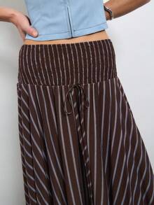 Nöista Stripe Midi Skirt With Smocked Waistband And Asymmetric Hem. Everyday, Brunch, Day-To-Night, Smart & Casual. Fall, Fall Winter Street Style. - Brown - View 7