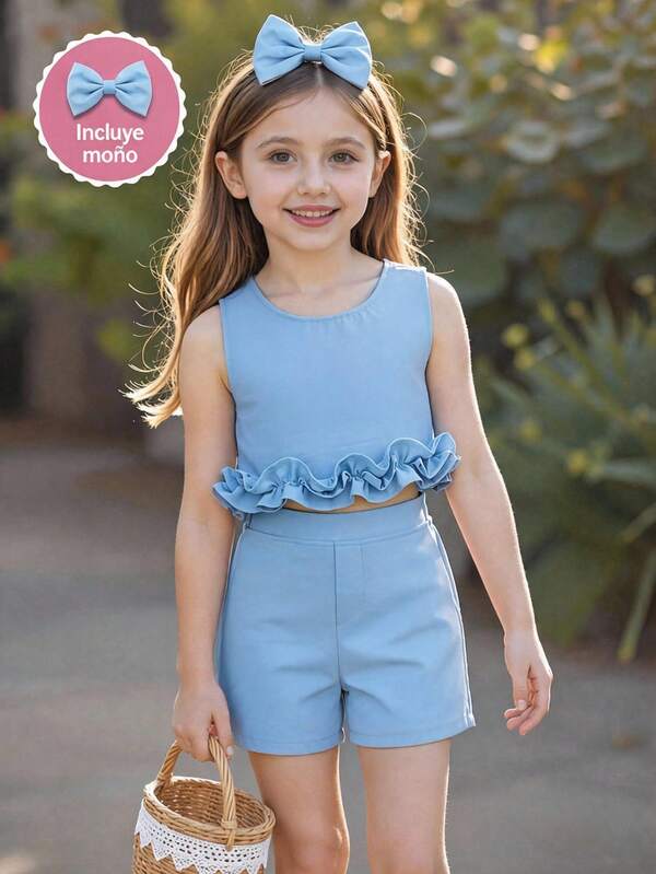Conjunto set de dos piezas para niña: top corto sin mangas con volantes, shorts y moño decorativo para cabello; un atuendo veraniego adorable.