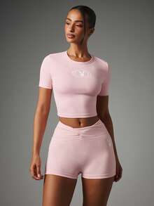 Missguided x Playboy Bunny Logo Crop Top With Open Back Detail And Crew Neck Short Sleeve Fitted Style - Pink - View 5