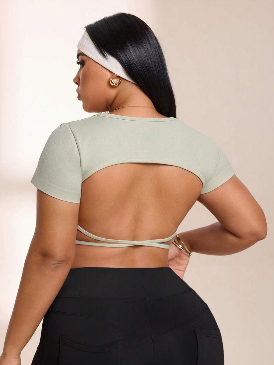 SHEIN Rhythm Era Women's Plus Size Solid Color Backless Cropped Sports T-Shirt - Baby Pink - View 1