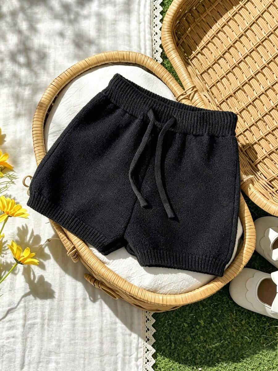 SHEIN كنزات وبنطلونات للفتيات المراهقات، شورتات محبوكة مرنة، باللون الأسود، مريحة، ناعمة، بسيطة، أساسية، أنيقة، مناسبة للخريف والشتاء والاستخدام اليومي العادي والخروجات والمدرسة والأنشطة الخارجية والتصوير والنزهات - الأسود - مشاهدة 1