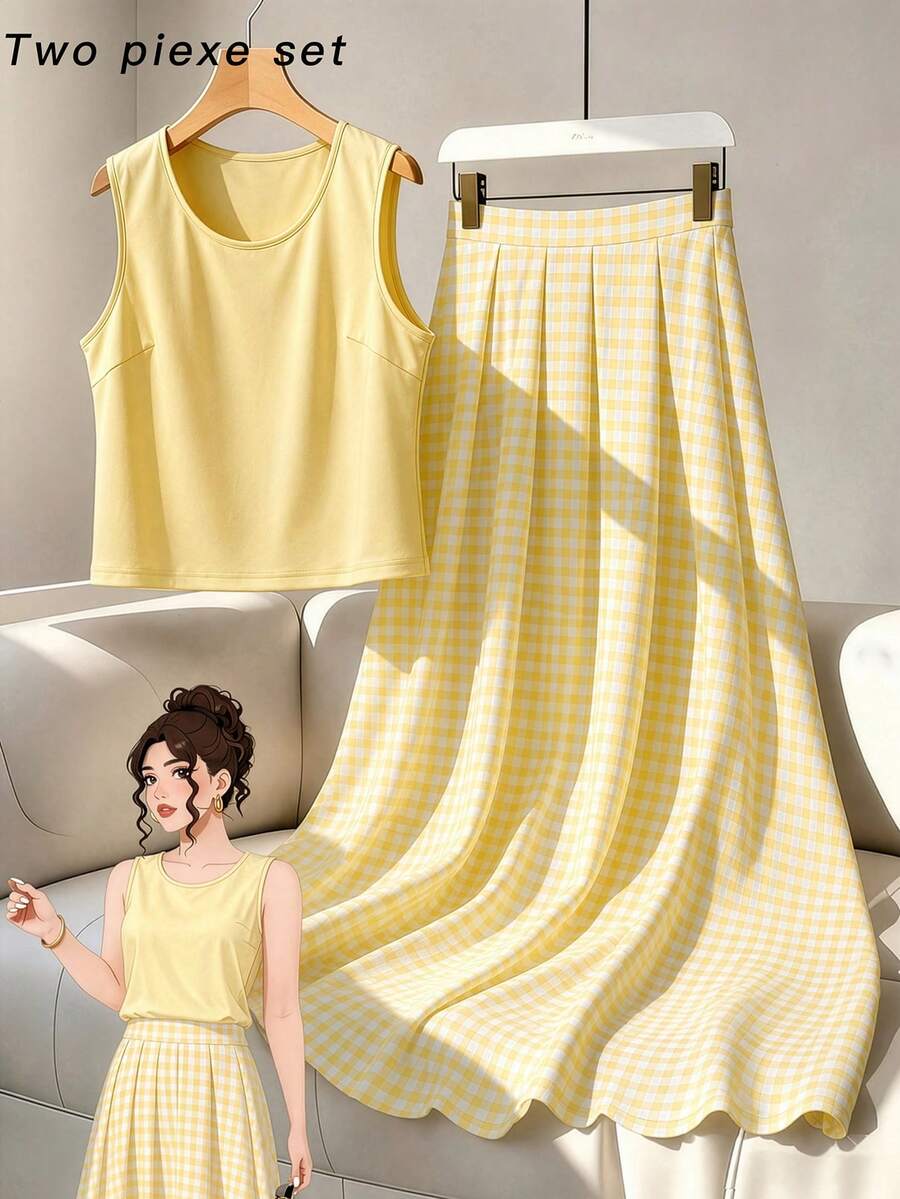 Rometta Plus Size Women's Casual Commute Solid Color Round Neck Tank Top And Plaid A-Line Pleated Skirt 2-Piece Set, Suitable For Summer, Back To School, Vacation, Graduation, Holiday, Valentine's Day, Christmas, Music Festival, Mother's Day, Halloween, Thanksgiving, Easter, National Day, Prom, Birthday, Date Party, Wedding Season, Outing And More