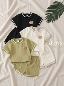 SHEIN 3 Set di Abbigliamento Estivo per Bambino Maschio, Magliette a Maniche Corte Morbide con Texture a Orsetto Carino e Pantaloncini, 2 Pezzi, Top Bianchi con Grafica, Abiti da Spiaggia Estivi - Multicolore - Visualizzare 10