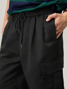 Men Flap Pocket Side Drawstring Waist Oversize Cargo Pants, Fall Wide Leg - Black - View 8