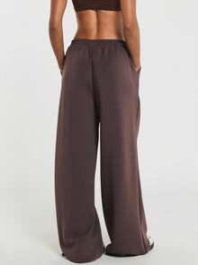 11SKNDS Wide Leg Sweatpants With Elastic Drawstring Waist, Relaxed Fit Fleece Joggers, Side Pockets, Small Logo Detail, Casual Everyday Comfort Pants - Brown - View 2