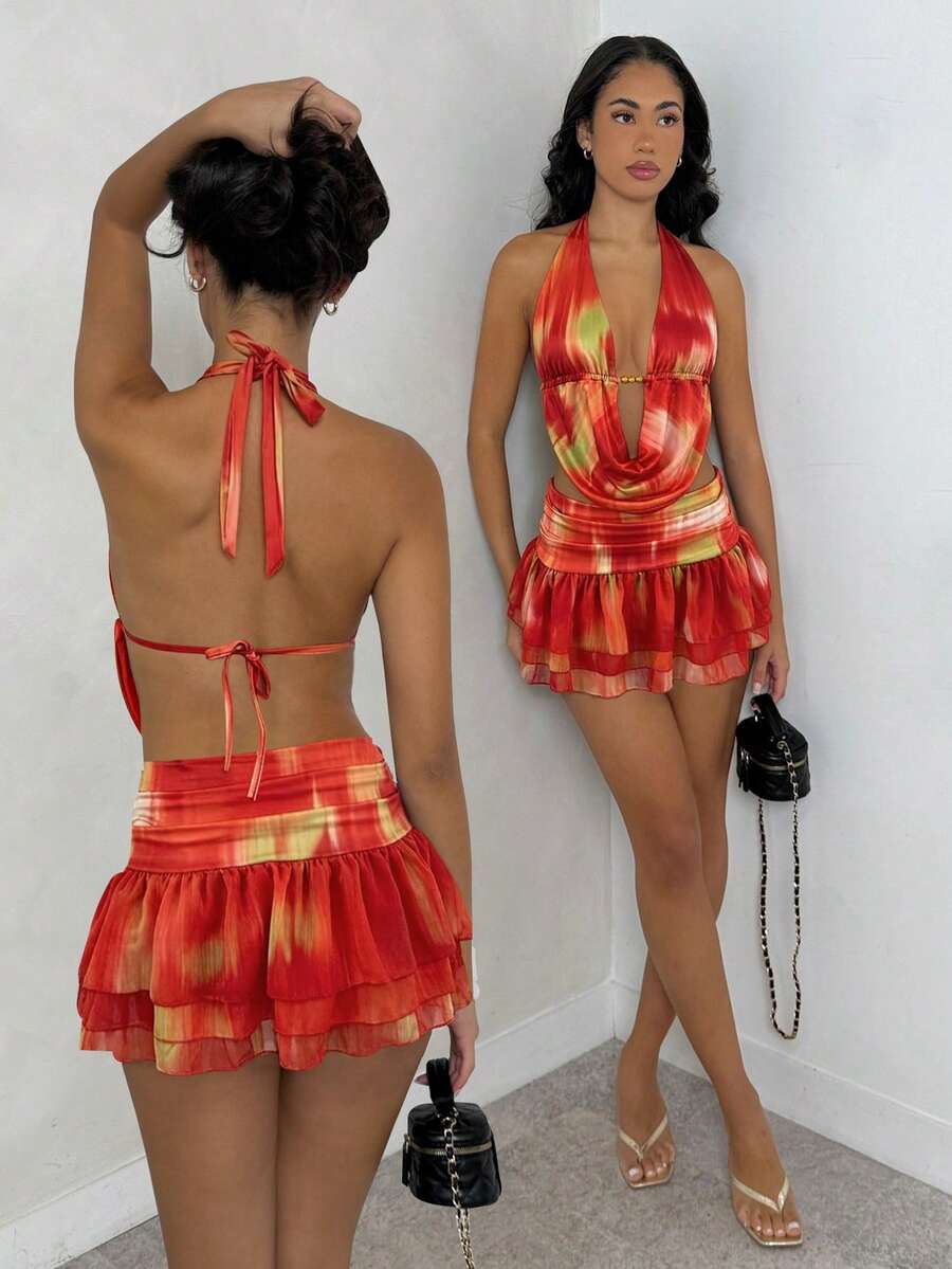 SHEIN Glamour 两件套印花露背吊带性感V领露背无袖不对称迷你裙套装,情人节套装,优雅套装,锐舞派对服装,街头服饰,演唱会服装,夜店服装,约会套装,女士生日套装,秋冬套装,派对必备 - 彩色 - 查看 1