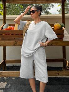 Muchica Conjunto casual de 2 piezas de top de manga corta de cuello redondo y pantalones cortos de unicolor para mujer - Gris Claro - Ver 5