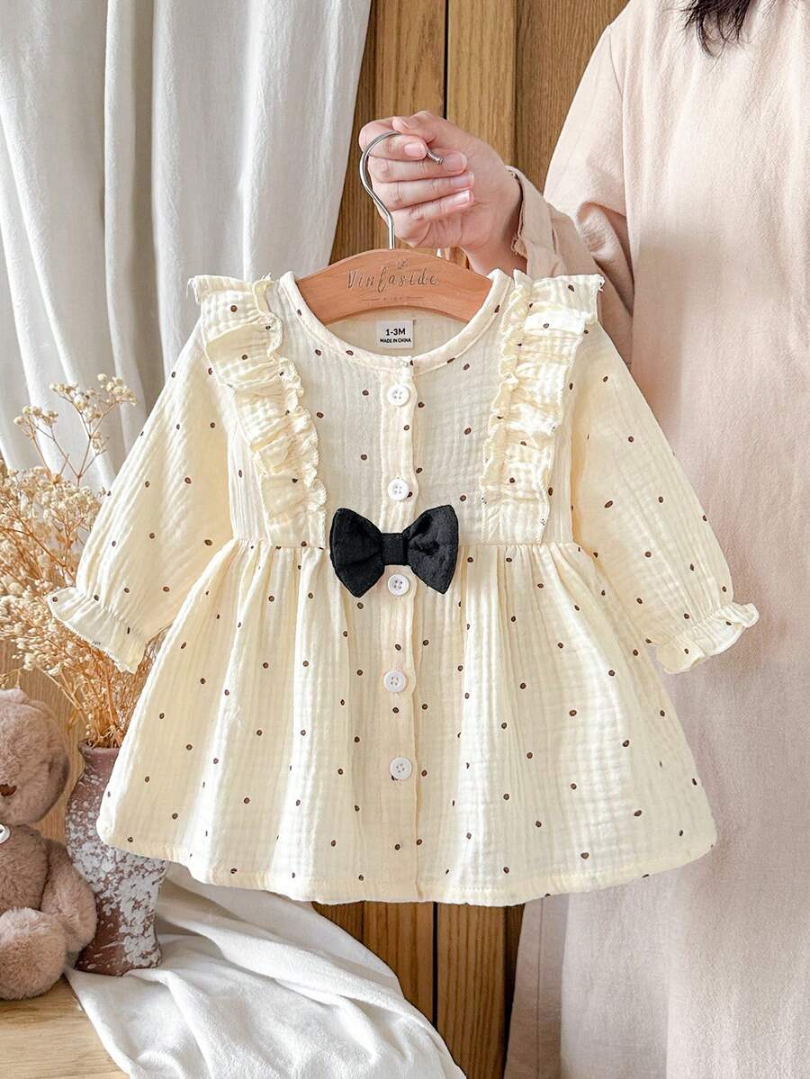 SHEIN Vintaside Kids 女嬰棉麻波點洋裝,可愛荷葉邊飾蝴蝶結長袖前開鈕扣 A 字裙,新生兒嬰兒波希米亞公主禮服 - 杏色 - 查看 1