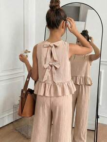 SHEIN 2pcs/Set Atasan Tank Top dan Legging Kasual Warna Aprikot dengan Leher Bulat dan Kain Bertekstur serta Pita di Belakang untuk Anak Perempuan Usia 8-12 Tahun - Aprikot - View 1