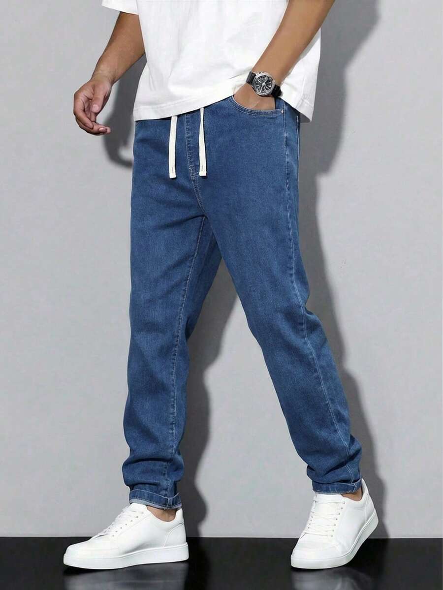 SHEIN Mirajuku 青少年男童弹力腰抽绳百搭简约休闲舒适修身浅灰色牛仔裤,适合秋冬季学校、校园、学院风穿着。 - 深色水洗藍 - 查看 1