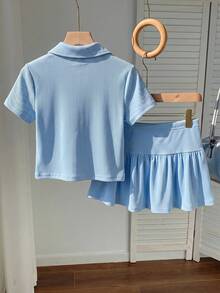 SHEIN 兒童青少年女孩針織拼色水藍色 Polo 短袖 T 恤與裙子休閒套裝 80 年代運動風端莊老錢風 返校季校園網球風 - 藍色 - 查看 2