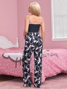 HELLO KITTY AND FRIENDS | SHEIN طقم بيجامة نسائي بطبعة كرتونية مع كاميسول وبنطلون طويل - الأسود - مشاهدة 2