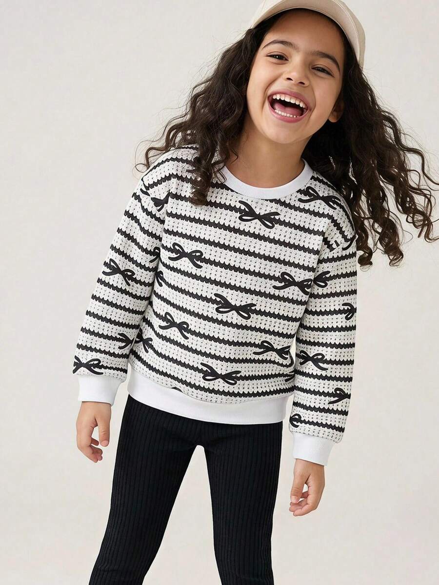 Maija Kids Maija Kids 2 piezas Conjunto para niña joven, elegante, casual, exquisito, cómodo, básico y versátil, con sudadera de punto de manga larga, cuello redondo, a rayas negras y blancas con patrón de lazo, y leggings negros, adecuado para volver a la escuela, salidas, actividades casuales, reuniones, otoño e invierno - Blanco y Negro - Ver 1