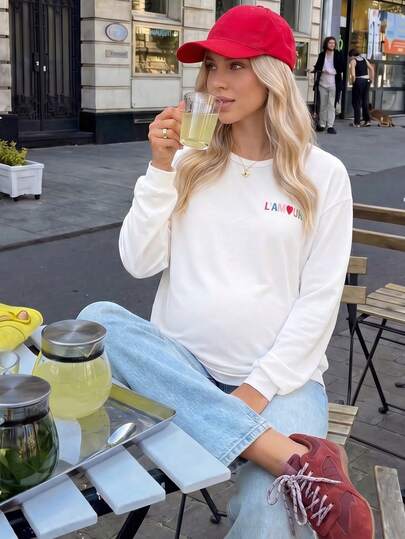 Lyckli Camiseta casual de manga larga con cuello redondo, hombros caídos y estampado de letras para maternidad
