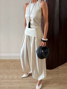 SHEIN BAE Conjunto de 2 piezas para mujer con top de tirantes halter sin espalda y pantalones farol en beige albaricoque, elegante y casual para ir al trabajo, uso diario, salidas casuales, conjunto práctico de satén albaricoque y blanco - Albaricoque - Ver 1