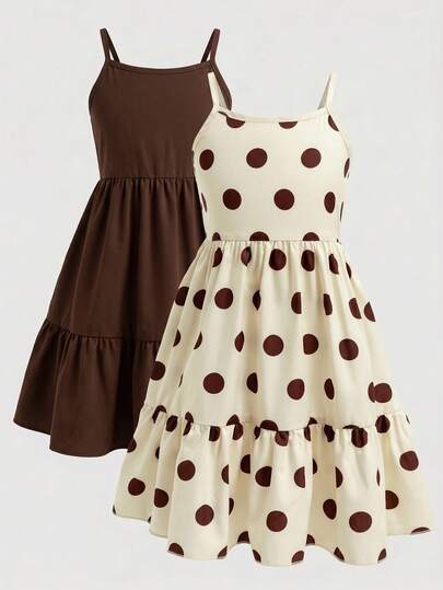 SHEIN 2 Styles Girls' Spaghetti Strap Cake Skirt, Cream Base With Dark Brown Polka Dot For Vintage Playful Look, Solid Brown For Minimalist Gentle Style. Both Feature Spaghetti Strap, Layered Skirt Hem With Fluid Lines, Harmonious Color Matching, Versatile Gentle Vintage Style For Various Occasions.