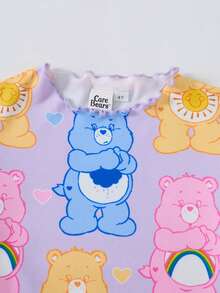 SHEIN X Care Bears طقم ملابس منزلية للبنات الصغيرات بطبعة كرتونية مع توب مزين بكشكشة وسروال ضيق - الأزرق - مشاهدة 3