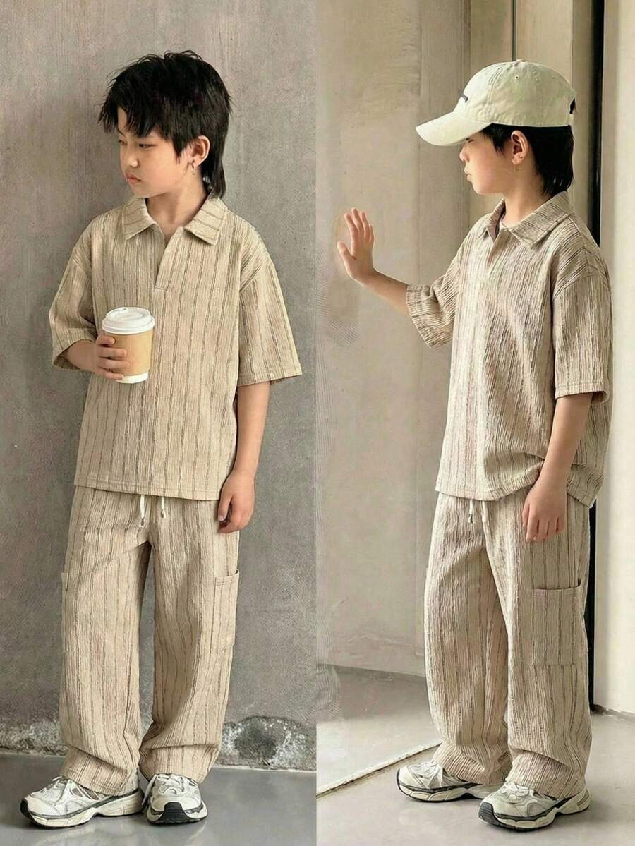 SHEIN 两件套青少年男女童装 - 米色纹理 Polo 衫和阔腿裤运动套装,适合春夏季节、郊游、情人节、约会、旅行、度假、家庭聚会、返校、婚礼、晚宴、运动、生日派对等场合。 - 卡其色 - 查看 1