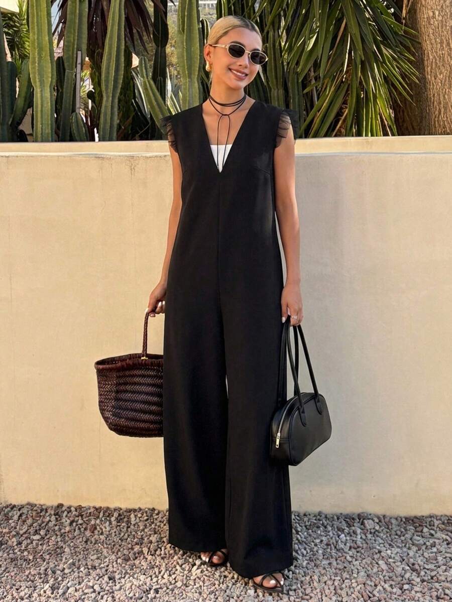 FRIFUL Women's Solid Color Deep V-Neck Shoulder Patchwork Sheer Mesh Straight Leg Loose Casual Versatile Spring Outfit Jumpsuit - Black - View 1