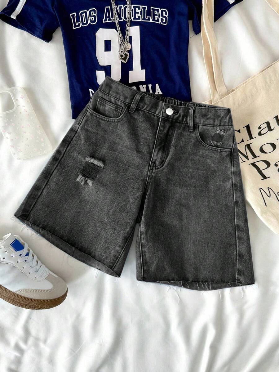 SHEIN Shorts vaqueros desgastados de tiro bajo con dobladillo deshilachado, estilo casual de primavera y verano para adolescentes, ideal para playa, vacaciones, boho, conciertos y festivales de verano - Negro - Ver 1