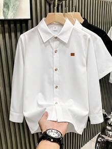 SHEIN 大童男孩純色短袖休閒前開鈕扣梭織襯衫，適合春夏，適用日常穿著、戶外玩耍、運動、上學、街頭風、派對與居家休閒 - 白色 - 查看 3