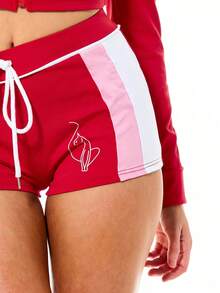BABYPHAT Sporty Jersey Booty Shorts With Color Block Panels, Drawstring Waist, And Logo Script Detail - Red - View 5