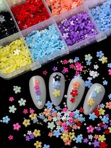 Este Conjunto de Arte de Unhas com 12 Compartimentos de Mistura Aleatória de Flores e Strass é Adequado para Salões de Unhas DIY, Festas na Praia, Férias de Verão e Uso Diário. Ele Apresenta um Brilho Cintilante, Aplicação Fácil, um Efeito 3D Elevado e um Visual. - Multicolorido - Visão 3