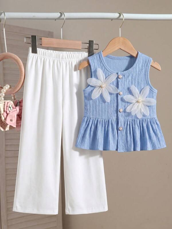 SHEIN Elladie kids Conjunto de top sin mangas con botones y decoración floral 3D y pantalones rectos casuales de cintura elástica de unicolor para niñas pequeñas, verano